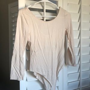 Cream colored bodysuit